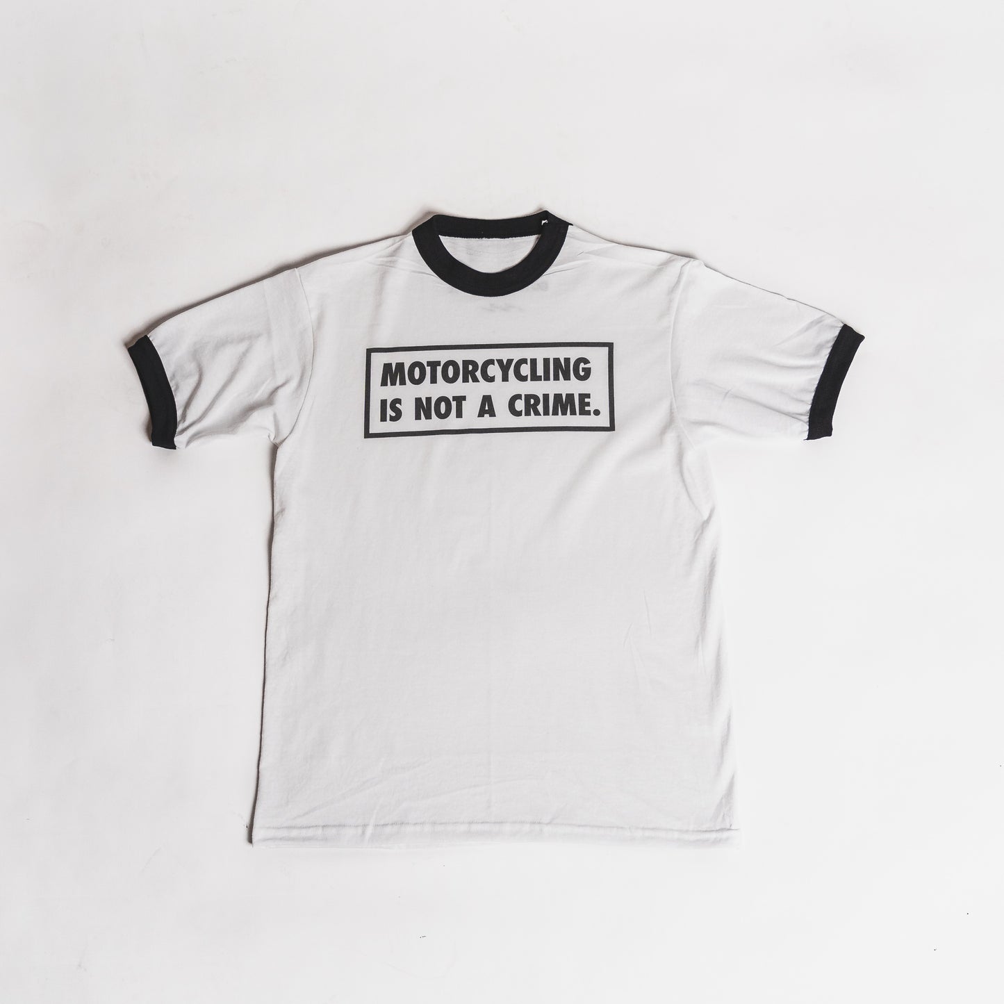 Motorcycling Is Not A Crime Ringer Tee - Black Friday